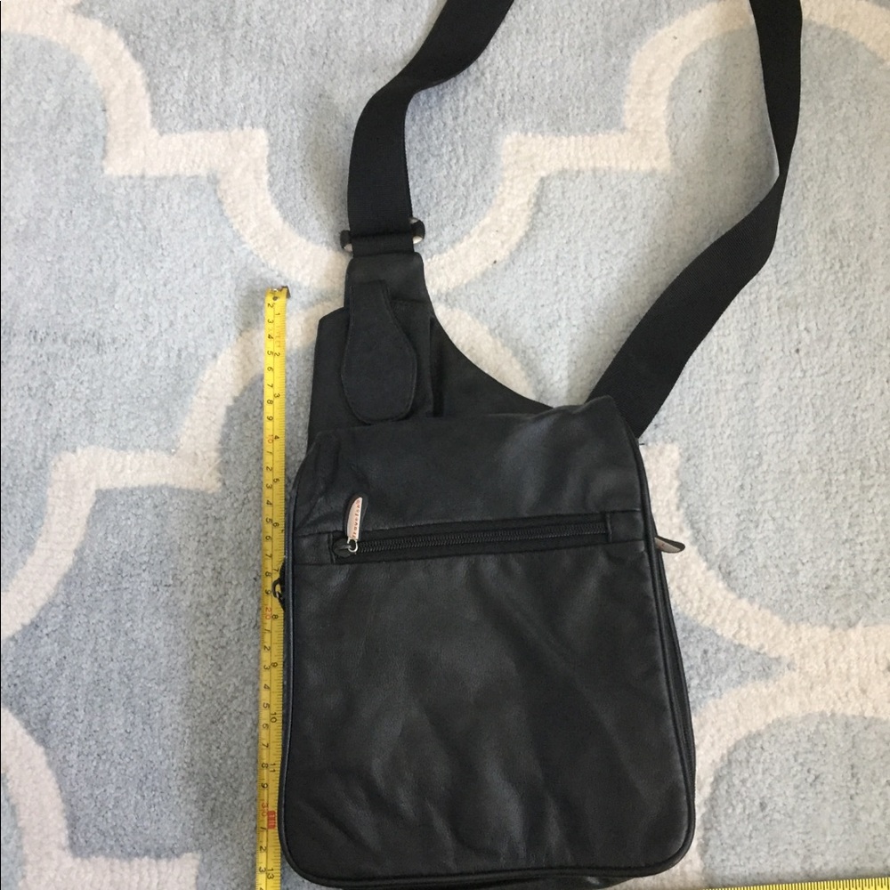 Black messenger/sling bag.
